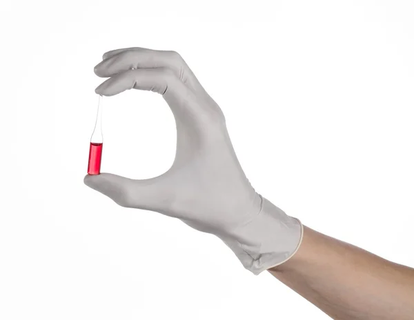 Doctor hand holding a vial, ampule red, vaccine ampule, Ebola vaccine, flu treatment, white background, isolated, gloved hand holding a vial, cancer vaccine, a vaccine against Ebola — Stock Photo, Image