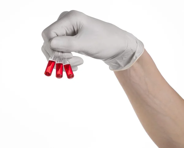 Doctor hand holding a vial, ampule red, vaccine ampule, Ebola vaccine, flu treatment, white background, isolated, gloved hand holding a vial, cancer vaccine, a vaccine against Ebola — Stock Photo, Image