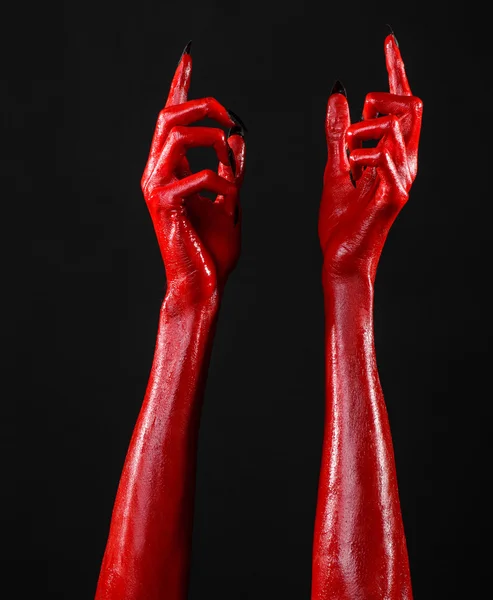 Mãos do Diabo Vermelho, mãos vermelhas de Satanás, tema de Halloween, fundo preto, isolado — Fotografia de Stock