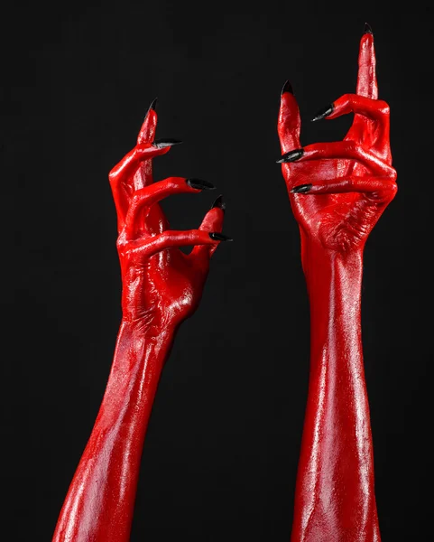 Red Devils händer, röda händer av Satan, Halloween tema, svart bakgrund, isolerade — Stockfoto