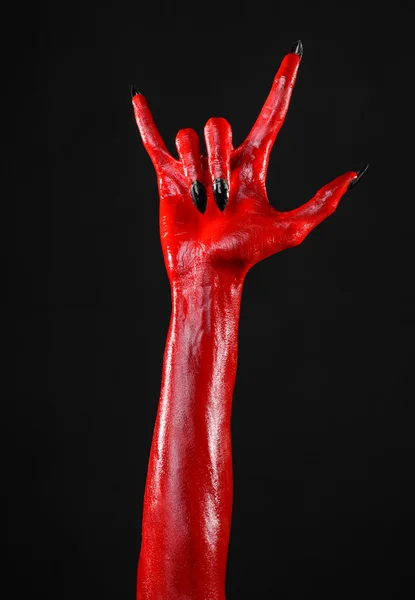 Red Devil's handen, rode handen van Satan, Halloween theme, zwarte achtergrond, geïsoleerd — Stockfoto