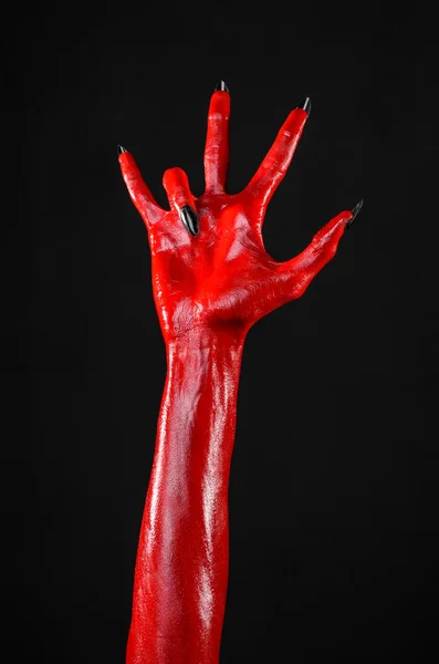 Mãos do Diabo Vermelho, mãos vermelhas de Satanás, tema de Halloween, fundo preto, isolado — Fotografia de Stock