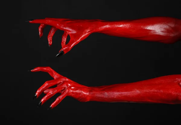 Mãos do Diabo Vermelho, mãos vermelhas de Satanás, tema de Halloween, fundo preto, isolado — Fotografia de Stock