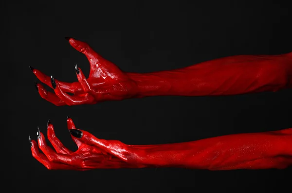 Mãos do Diabo Vermelho, mãos vermelhas de Satanás, tema de Halloween, fundo preto, isolado — Fotografia de Stock