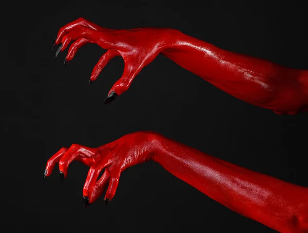 Mãos do Diabo Vermelho, mãos vermelhas de Satanás, tema de Halloween, fundo preto, isolado — Fotografia de Stock