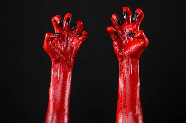 Mãos do Diabo Vermelho, mãos vermelhas de Satanás, tema de Halloween, fundo preto, isolado — Fotografia de Stock