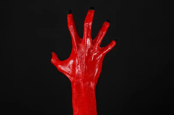 赤い悪魔、赤い手、サタンのハロウィーンのテーマ、分離された黒の背景 — ストック写真