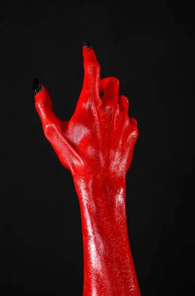 Mãos do Diabo Vermelho, mãos vermelhas de Satanás, tema de Halloween, fundo preto, isolado — Fotografia de Stock