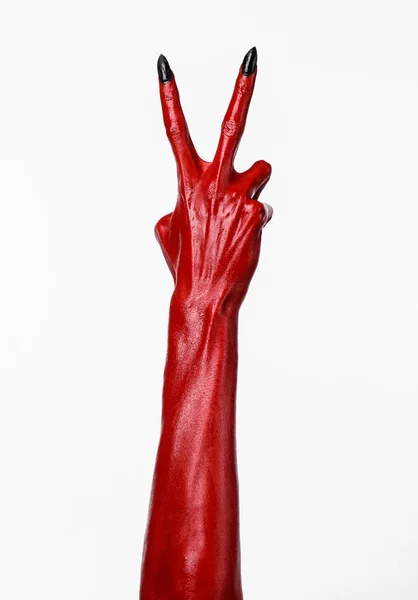 Halloween Tema, beyaz arka plan, izole kırmızı şeytan'ın eller, kırmızı eller şeytanın — Stok fotoğraf