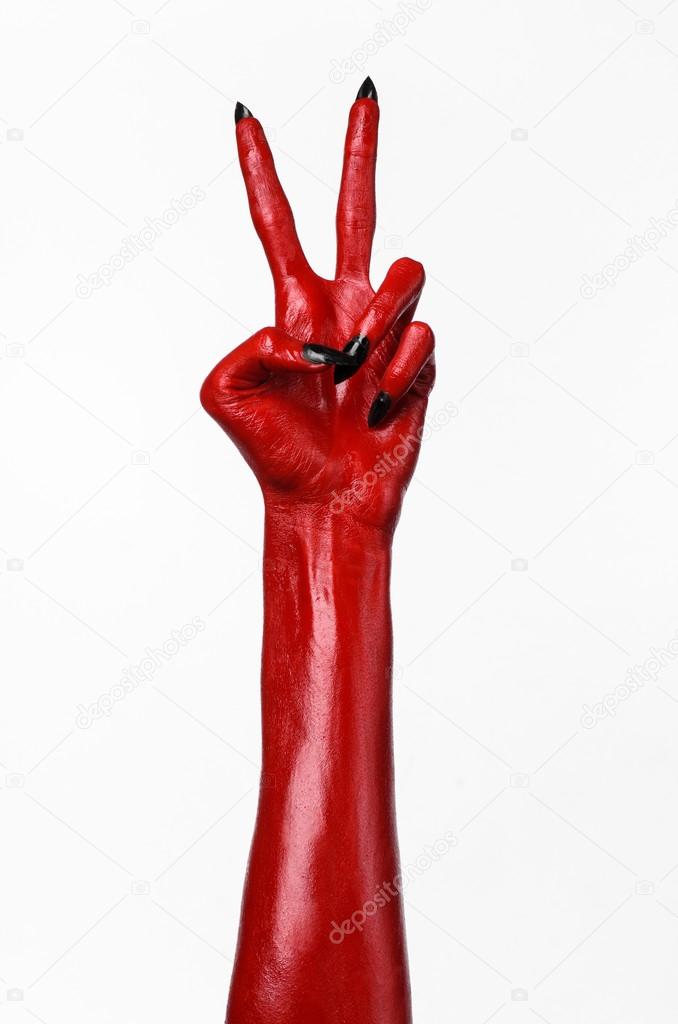 Red Devil's hands, red hands of Satan, Halloween theme, white background, isolated