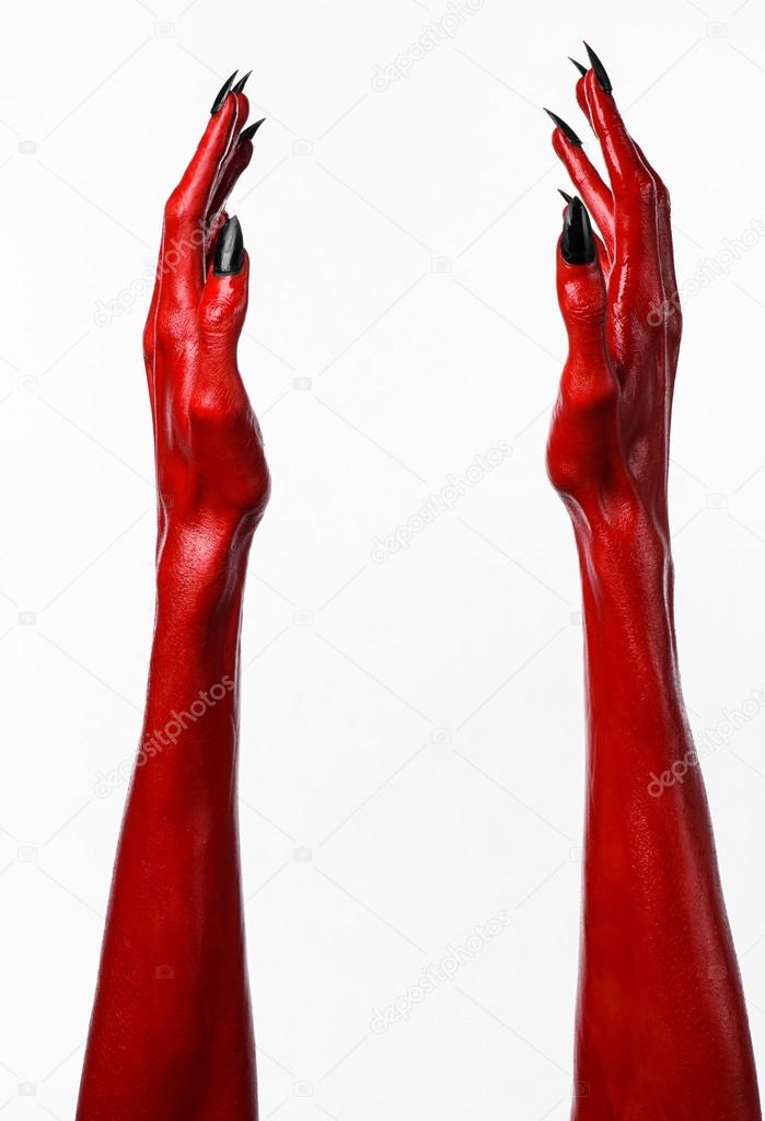 Red Devil's hands, red hands of Satan, Halloween theme, white background, isolated