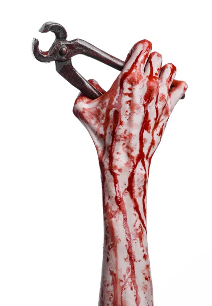 Halloween theme: bloody hand holding a pliers on a white background — Stock Photo, Image