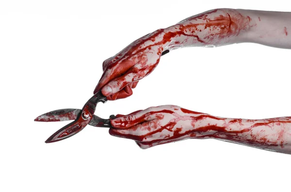 Halloween theme: bloody hand holding a big old bloody scissors on a white background — Stock Photo, Image