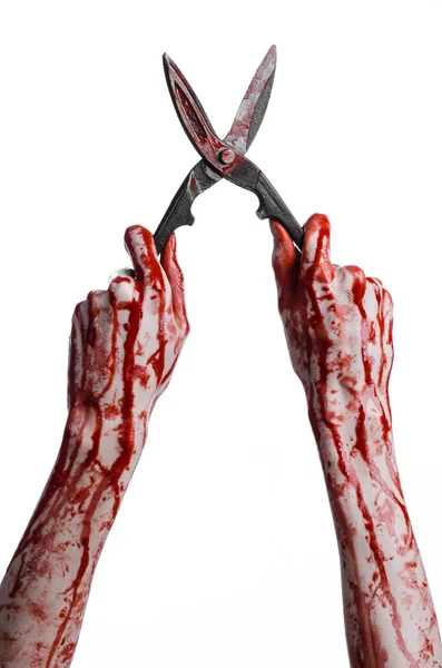 Halloween theme: bloody hand holding a big old bloody scissors on a white background — Stock Photo, Image