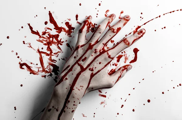 Bloody halloween theme: bloody hand print on a white leaves bloody wall — Stock Photo, Image