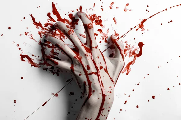 Bloody halloween theme: bloody hand print on a white leaves bloody wall