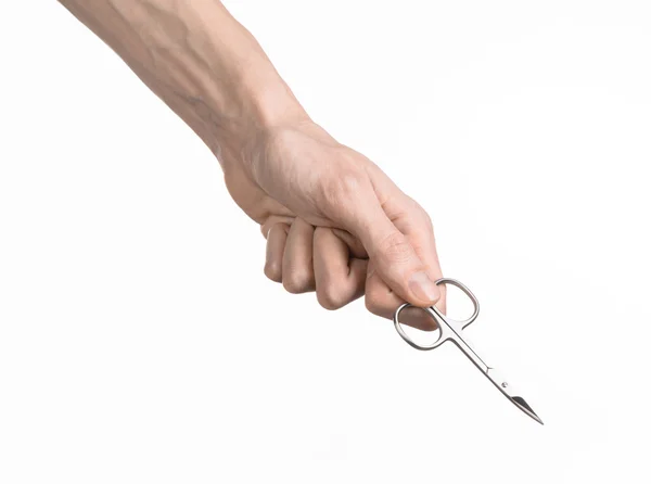 健康和个人护理: 手中拿着剪刀为孤立的白色背景上的指甲 — 图库照片