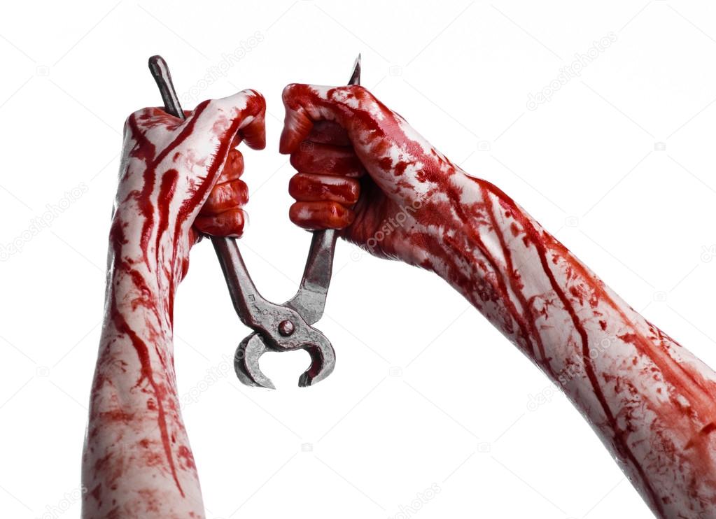 Halloween theme: bloody hand holding a pliers on a white background