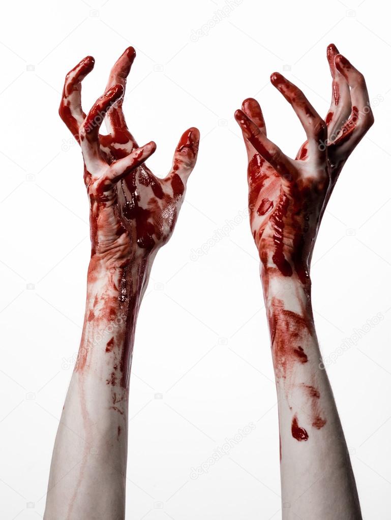 Bloody halloween theme: bloody hands killer zombie isolated on white background in studio