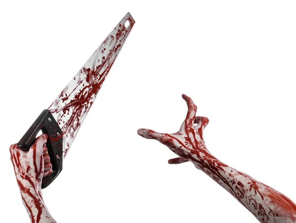 Halloween theme: bloody hand holding a bloody saw on a white background — Stock Photo, Image