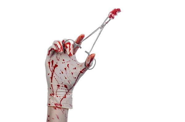 Surgery and medicine theme: doctor bloody hand in glove holding a bloody surgical clamp with swab and performs surgery on an isolated white background in studio — Stock Photo, Image