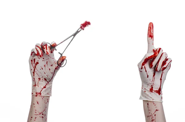 Surgery and medicine theme: doctor bloody hand in glove holding a bloody surgical clamp with swab and performs surgery on an isolated white background in studio — Stock Photo, Image