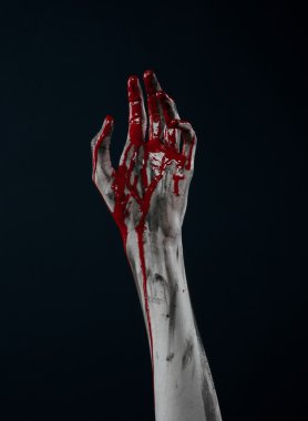 Kanlı Halloween Tema: korkunç zombi iblis kanlı eller üzerinde siyah bir arka plan