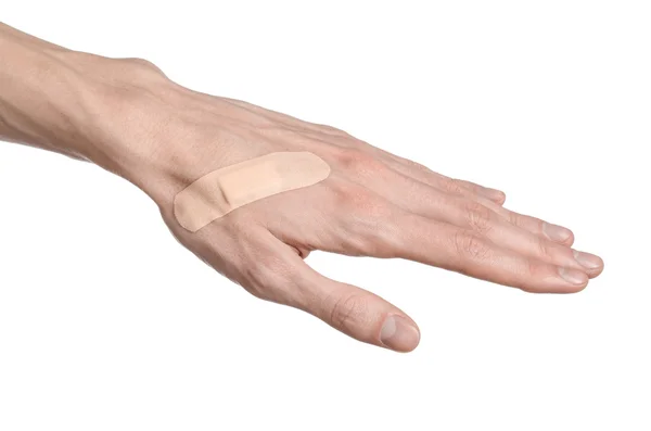 Ιατρικό θέμα: για έναν άνθρωπο του χέρι κολλημένο ιατρική γύψο γύψο πρώτων βοηθειών διαφήμιση σε λευκό φόντο — Φωτογραφία Αρχείου