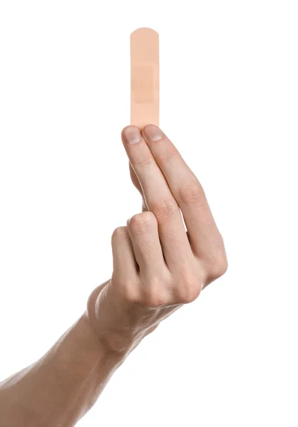 Tema médico: para a mão de um homem colado gesso médico publicidade gesso de primeiros socorros em um fundo branco — Fotografia de Stock