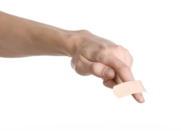 Ιατρικό θέμα: για έναν άνθρωπο του χέρι κολλημένο ιατρική γύψο γύψο πρώτων βοηθειών διαφήμιση σε λευκό φόντο — Φωτογραφία Αρχείου