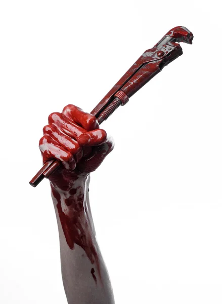 Bloody hand holding an adjustable wrench, bloody key, crazy plumber, bloody theme,halloween theme, white background,isolated , bloody hand of an assassin, bloody murderer, psycho, bloody monkey wrench — Stock Photo, Image