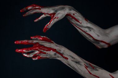 Kanlı Halloween Tema: korkunç zombi iblis kanlı eller üzerinde siyah bir arka plan
