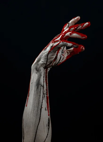 Bloody Halloween theme: horrible zombie demon bloody hands on a black background — Stock Photo, Image