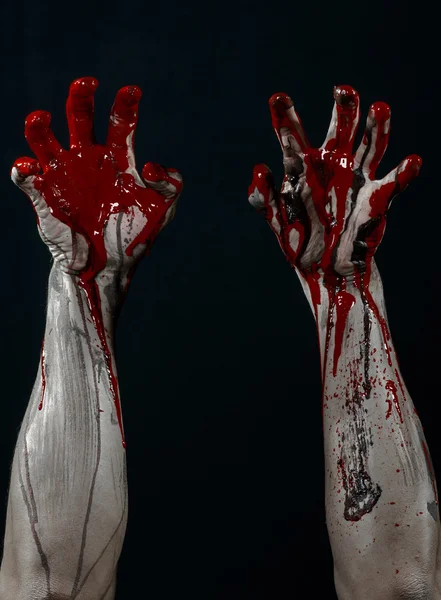 Bloody Halloween theme: horrible zombie demon bloody hands on a black background — Stock Photo, Image