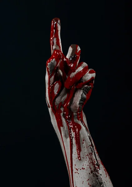 Bloody Halloween theme: horrible zombie demon bloody hands on a black background — Stock Photo, Image