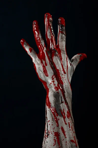 Bloody Halloween theme: horrible zombie demon bloody hands on a black background — Stock Photo, Image