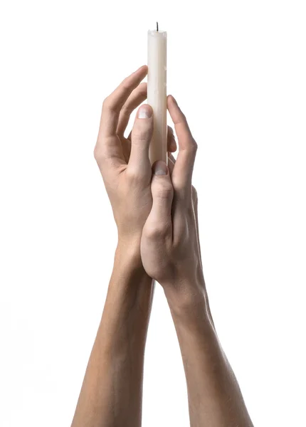 Mãos segurando uma vela, uma vela é acesa, fundo branco, solidão, calor, no escuro, Mãos morte, mãos bruxa — Fotografia de Stock