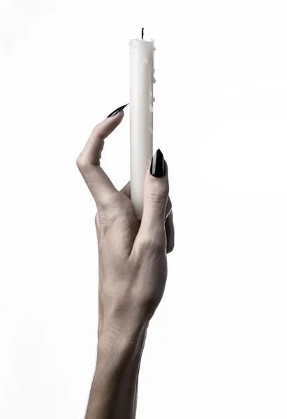Mani che tengono una candela, una candela è accesa, sfondo bianco, solitudine, calore, al buio, Mani morte, mani strega — Foto Stock