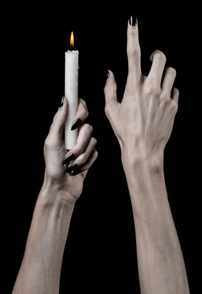 Hands holding a candle, a candle is lit, black background, solitude, warmth, in the dark, Hands death, hands witch — Stock Photo, Image