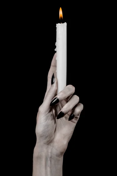 Hands holding a candle, a candle is lit, black background, solitude, warmth, in the dark, Hands death, hands witch — Stock Photo, Image