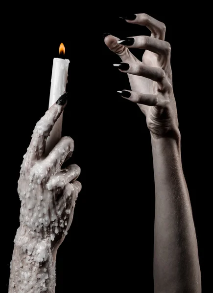 Hands holding a candle, a candle is lit, black background, solitude, warmth, in the dark, Hands death, hands witch — Stock Photo, Image