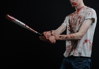 Kanlı Konu: kanlı bir yarasa siyah bir arka plan üzerinde tutarak Kanlı tişört giyen