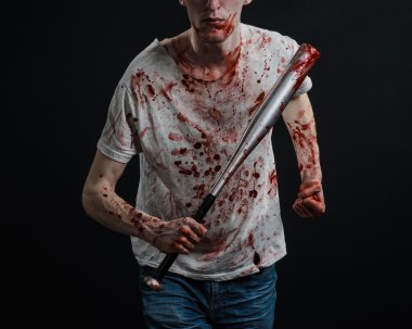 Kanlı Konu: kanlı bir yarasa siyah bir arka plan üzerinde tutarak Kanlı tişört giyen