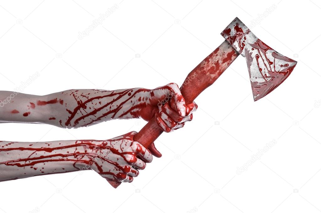Bloody Halloween theme: bloody hand holding a bloody butcher's ax isolated on white background in studio
