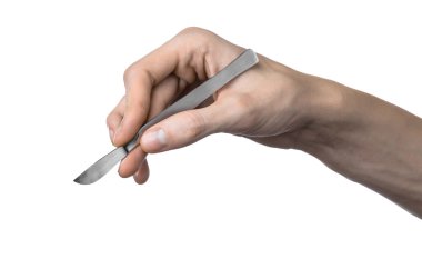 The hand holding the scalpel, white background, isolated clipart