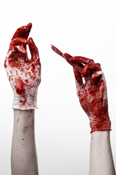 Bloody hands in gloves with the scalpel, white background, isolated, doctor, killer, maniac