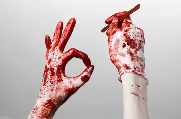 Bloody hands in gloves with the scalpel, white background, isolated, doctor, killer, maniac — Stock Photo, Image