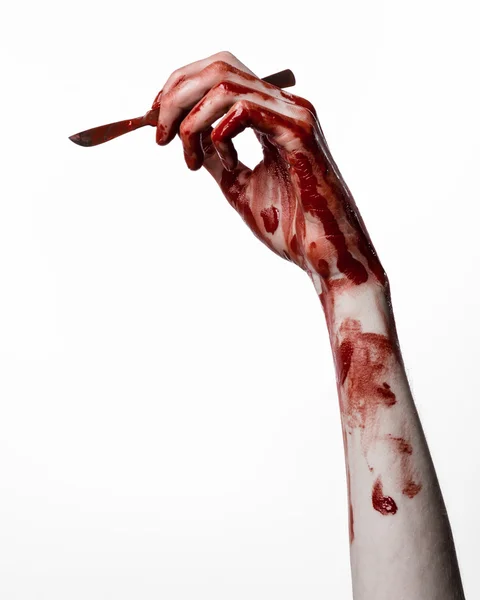 Bloody mão com um bisturi, um prego, fundo branco, zumbi, demônio, maníaco — Fotografia de Stock