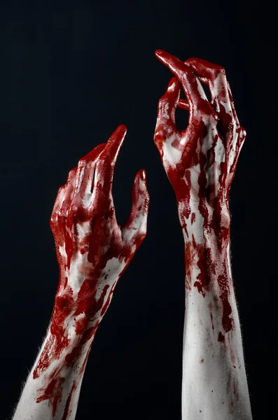 Bloody hands in white gloves, a scalpel, a nail, black background, zombie, demon, maniac — Stock Photo, Image