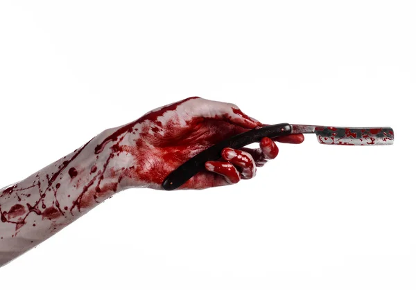 Bloody Halloween theme: bloody hand holds a razor sharp old with a dangerous edge isolated on white background — Stock Photo, Image